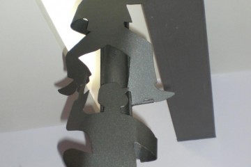 Elementi di caratterizzazione dell'arredo: sagome metalliche a falso supporto della travatura metallica